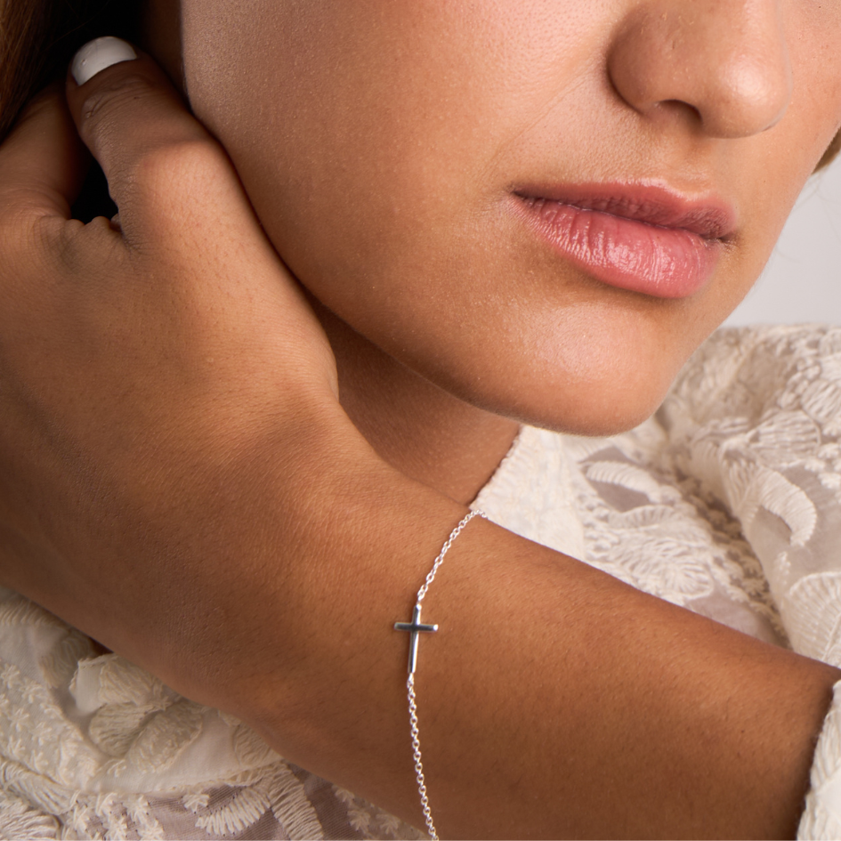 women with bracelet silver crucifix faith