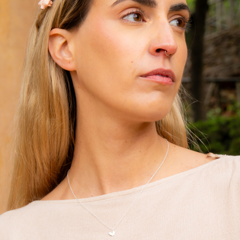 Bunny rabbit necklace worn as a subtle, meaningful sterling silver necklace, perfect for everyday wear.